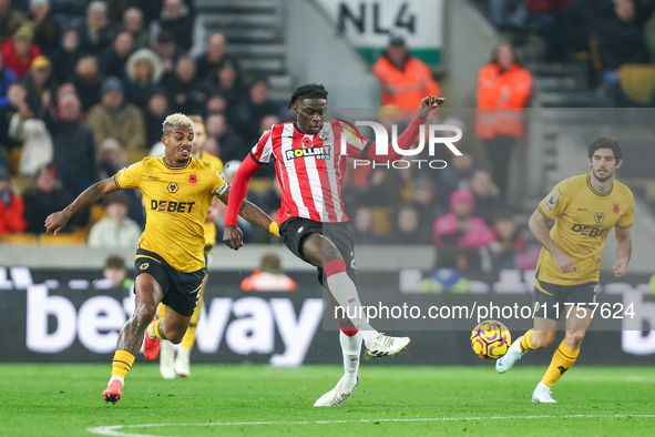 Lesley Ugochukwu of Southampton plays the ball back during the Premier League match between Wolverhampton Wanderers and Southampton at Molin...