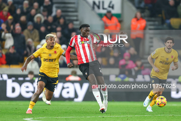 Lesley Ugochukwu of Southampton plays the ball back during the Premier League match between Wolverhampton Wanderers and Southampton at Molin...