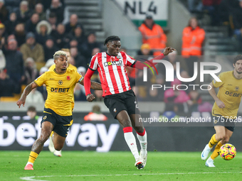 Lesley Ugochukwu of Southampton plays the ball back during the Premier League match between Wolverhampton Wanderers and Southampton at Molin...