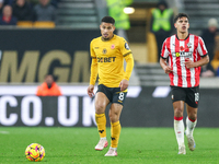 Joao Gomes of Wolves plays the ball forward during the Premier League match between Wolverhampton Wanderers and Southampton at Molineux in W...