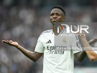 Vinicius Junior left winger of Real Madrid and Brazil third goal during the La Liga match between Real Madrid CF and CA Osasuna at Estadio S...