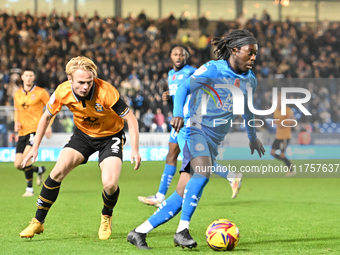 Abraham Odoh (10 Peterborough United) is challenged by Liam Bennet (2 Cambridge United) during the Sky Bet League 1 match between Peterborou...