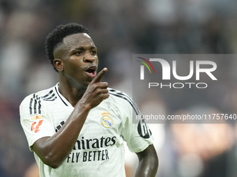 Vinicius Junior left winger of Real Madrid and Brazil third goal during the La Liga match between Real Madrid CF and CA Osasuna at Estadio S...