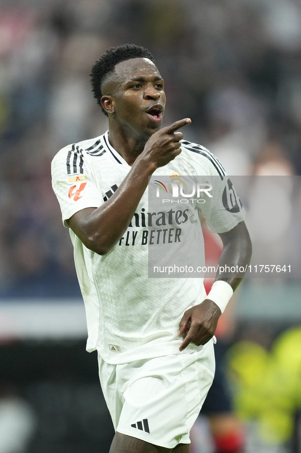 Vinicius Junior left winger of Real Madrid and Brazil third goal during the La Liga match between Real Madrid CF and CA Osasuna at Estadio S...