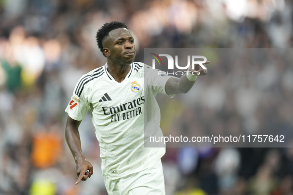 Vinicius Junior left winger of Real Madrid and Brazil third goal during the La Liga match between Real Madrid CF and CA Osasuna at Estadio S...