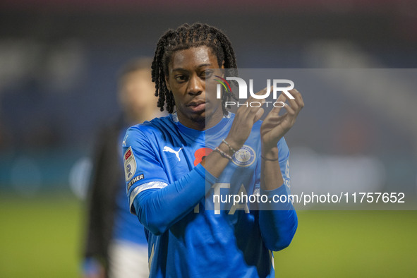 Tayo Adaramola #33 of Stockport County F.C. applauds at full time during the Sky Bet League 1 match between Stockport County and Bolton Wand...