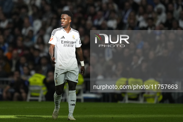 Vinicius Junior left winger of Real Madrid and Brazil during the La Liga match between Real Madrid CF and CA Osasuna at Estadio Santiago Ber...