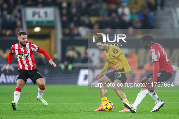 Rayan Ait-Nouri of Wolves controls the ball while being pressed by Lesley Ugochukwu of Southampton during the Premier League match between W...