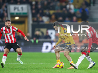 Rayan Ait-Nouri of Wolves controls the ball while being pressed by Lesley Ugochukwu of Southampton during the Premier League match between W...