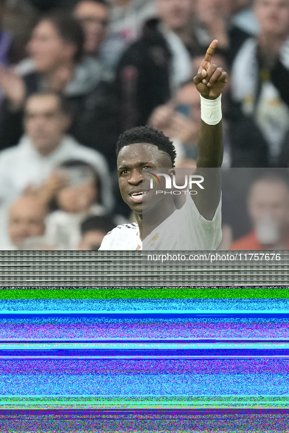 Vinicius Junior left winger of Real Madrid and Brazil celebrates after scoring his sides second goal during the La Liga match between Real M...