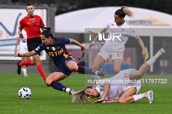 Evelyne Viens of A.S. Roma Femminile, Emma Severini of A.C.F Fiorentina, and Marina Georgieva of A.C.F Fiorentina are in action during the 9...