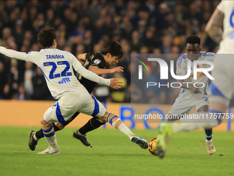 Koki Saito (QPR) is fouled by Ao Tanaka (Leeds United) during the Sky Bet Championship match between Leeds United and Queens Park Rangers at...