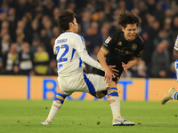 Koki Saito (QPR) is fouled by Ao Tanaka (Leeds United) during the Sky Bet Championship match between Leeds United and Queens Park Rangers at...