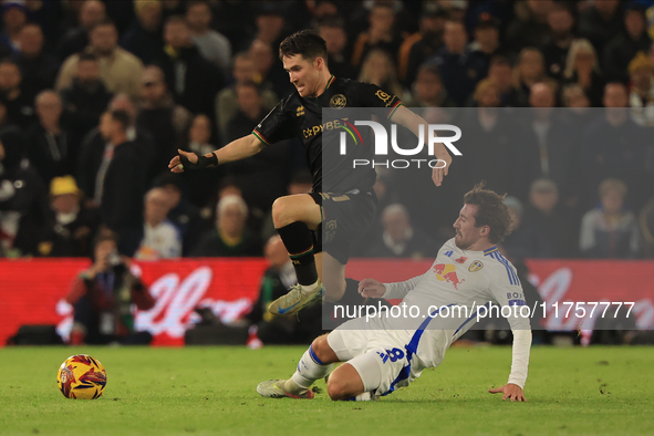 Paul Smyth (QPR) skips over a challenge by Joe Rothwell (Leeds United) during the Sky Bet Championship match between Leeds United and Queens...