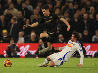 Paul Smyth (QPR) skips over a challenge by Joe Rothwell (Leeds United) during the Sky Bet Championship match between Leeds United and Queens...