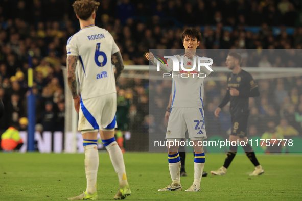 Ao Tanaka of Leeds United talks to Joe Rodon of Leeds United during the Sky Bet Championship match between Leeds United and Queens Park Rang...