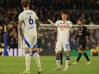 Ao Tanaka of Leeds United talks to Joe Rodon of Leeds United during the Sky Bet Championship match between Leeds United and Queens Park Rang...