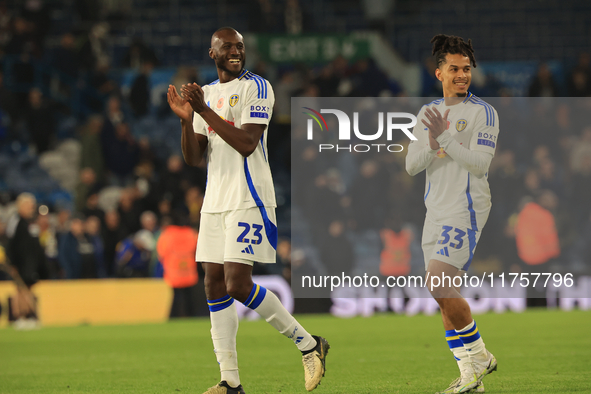 Josuha Guilavogui (Leeds United) and Isaac Schmidt (Leeds United) smile after the Sky Bet Championship match between Leeds United and Queens...