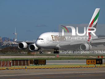 An Airbus A380-861 from Emirates lands at Barcelona airport in Barcelona, Spain, on October 8, 2024. (