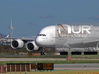 An Airbus A380-861 from Emirates lands at Barcelona airport in Barcelona, Spain, on October 8, 2024. (