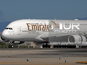 An Airbus A380-861 from Emirates lands at Barcelona airport in Barcelona, Spain, on October 8, 2024. (