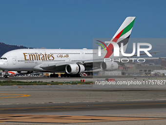 An Airbus A380-861 from Emirates lands at Barcelona airport in Barcelona, Spain, on October 8, 2024. (