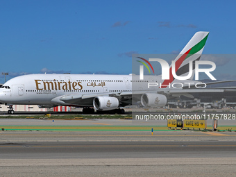 An Airbus A380-861 from Emirates lands at Barcelona airport in Barcelona, Spain, on October 8, 2024. (