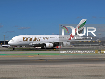 An Airbus A380-861 from Emirates lands at Barcelona airport in Barcelona, Spain, on October 8, 2024. (