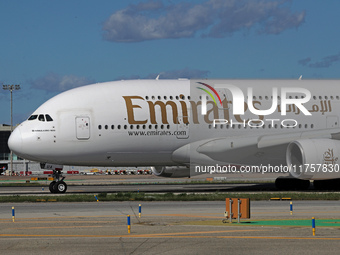 An Airbus A380-861 from Emirates lands at Barcelona airport in Barcelona, Spain, on October 8, 2024. (