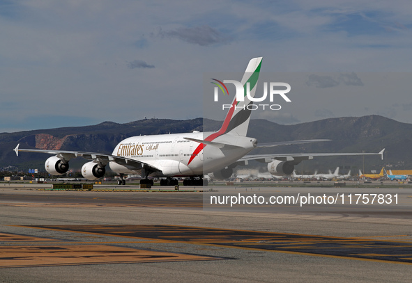 An Airbus A380-861 from Emirates lands at Barcelona airport in Barcelona, Spain, on October 8, 2024. 