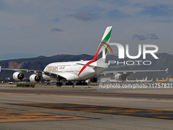 An Airbus A380-861 from Emirates lands at Barcelona airport in Barcelona, Spain, on October 8, 2024. (