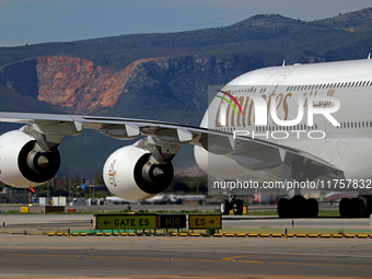 An Airbus A380-861 from Emirates lands at Barcelona airport in Barcelona, Spain, on October 8, 2024. (