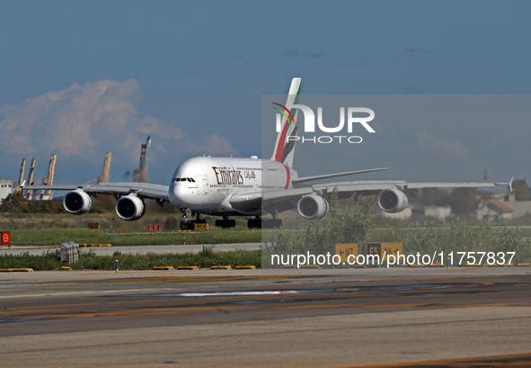 An Airbus A380-861 from Emirates lands at Barcelona airport in Barcelona, Spain, on October 8, 2024. 