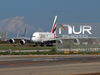 An Airbus A380-861 from Emirates lands at Barcelona airport in Barcelona, Spain, on October 8, 2024. (