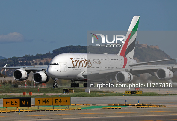 An Airbus A380-861 from Emirates lands at Barcelona airport in Barcelona, Spain, on October 8, 2024. 