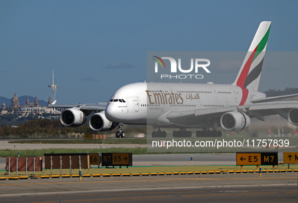 An Airbus A380-861 from Emirates lands at Barcelona airport in Barcelona, Spain, on October 8, 2024. 