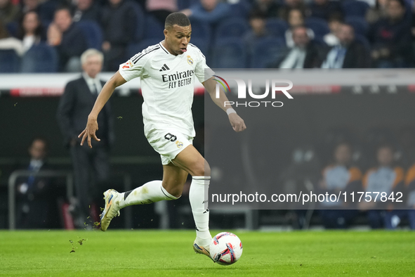 Kylian Mbappe centre-forward of Real Madrid and France in action during the La Liga match between Real Madrid CF and CA Osasuna at Estadio S...