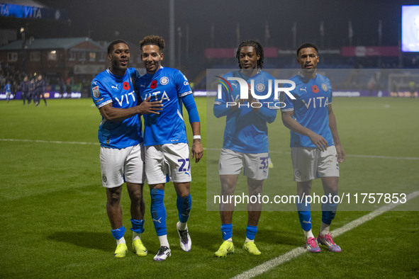 Stockport County F.C. players celebrate at full time during the Sky Bet League 1 match between Stockport County and Bolton Wanderers at the...