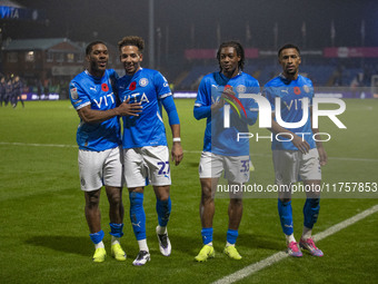 Stockport County F.C. players celebrate at full time during the Sky Bet League 1 match between Stockport County and Bolton Wanderers at the...