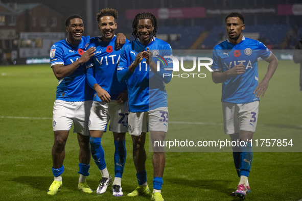 Stockport County F.C. players celebrate at full time during the Sky Bet League 1 match between Stockport County and Bolton Wanderers at the...