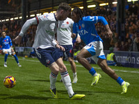 Tayo Adaramola, number 33 of Stockport County F.C., goes past the opponent during the Sky Bet League 1 match between Stockport County and Bo...