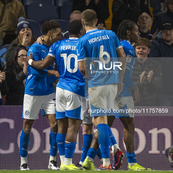 Odin Bailey #27 of Stockport County F.C. celebrates his goal with teammates during the Sky Bet League 1 match between Stockport County and B...