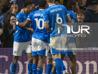 Odin Bailey #27 of Stockport County F.C. celebrates his goal with teammates during the Sky Bet League 1 match between Stockport County and B...