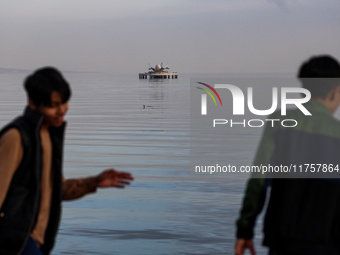 Children play on Caspian Sea Boulevard in Baku, Azerbaijan on November 9, 2024. (