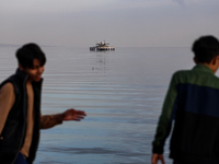 Children play on Caspian Sea Boulevard in Baku, Azerbaijan on November 9, 2024. (