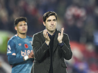 Andoni Iraola, manager of Bournemouth, thanks the traveling support during the Premier League match between Brentford and Bournemouth at the...