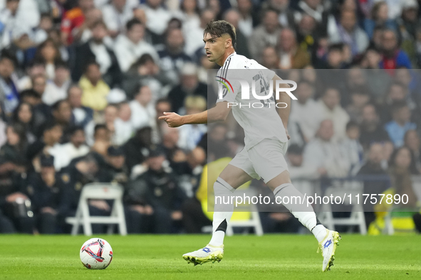 Raul Asencio centre-back of Real Madrid and Spain during the La Liga match between Real Madrid CF and CA Osasuna at Estadio Santiago Bernabe...