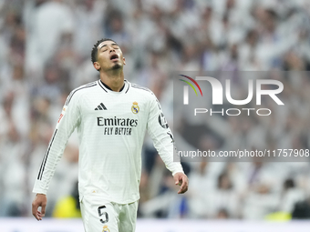 Jude Bellingham central midfield of Real Madrid and England celebrates after scoring his sides first goal during the La Liga match between R...