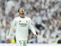 Jude Bellingham central midfield of Real Madrid and England celebrates after scoring his sides first goal during the La Liga match between R...