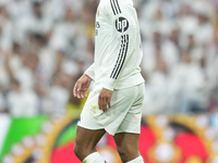 Jude Bellingham central midfield of Real Madrid and England celebrates after scoring his sides first goal during the La Liga match between R...